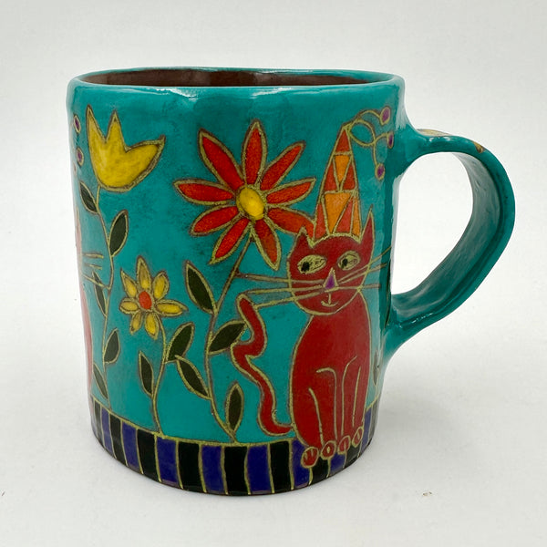 Red Cats in Flowers on Purple and Black Cup