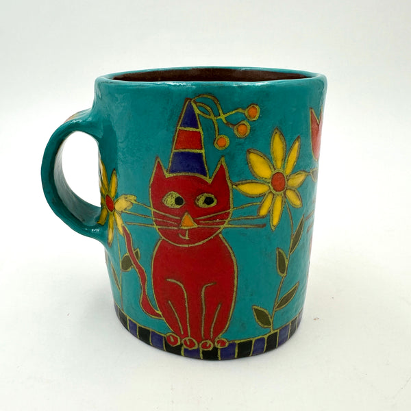 Red Cats in Flowers on Purple and Black Cup