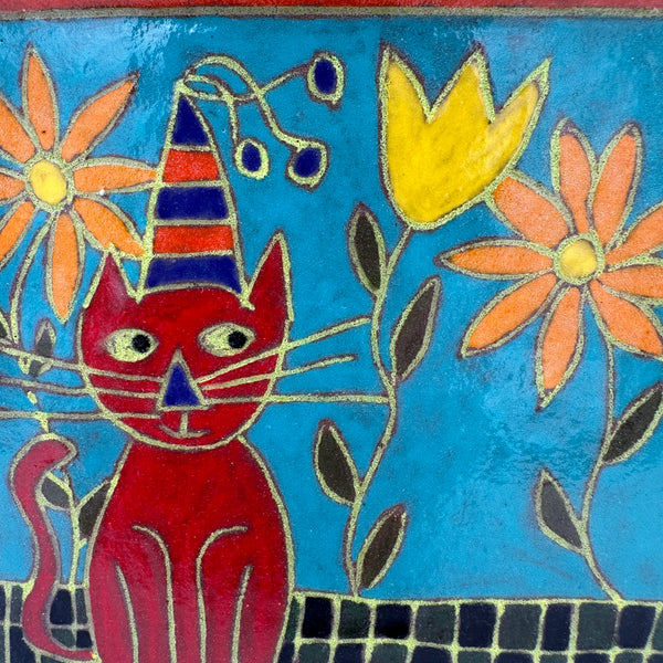 Red Cat sitting amongst Flowers (small)