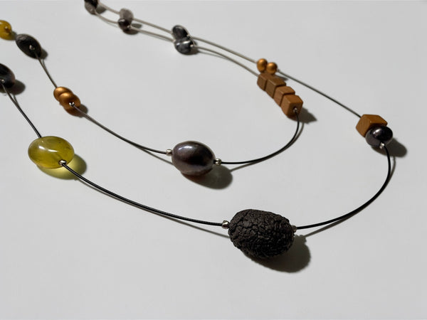 Porcelain and Stoneware Long Strand Necklace